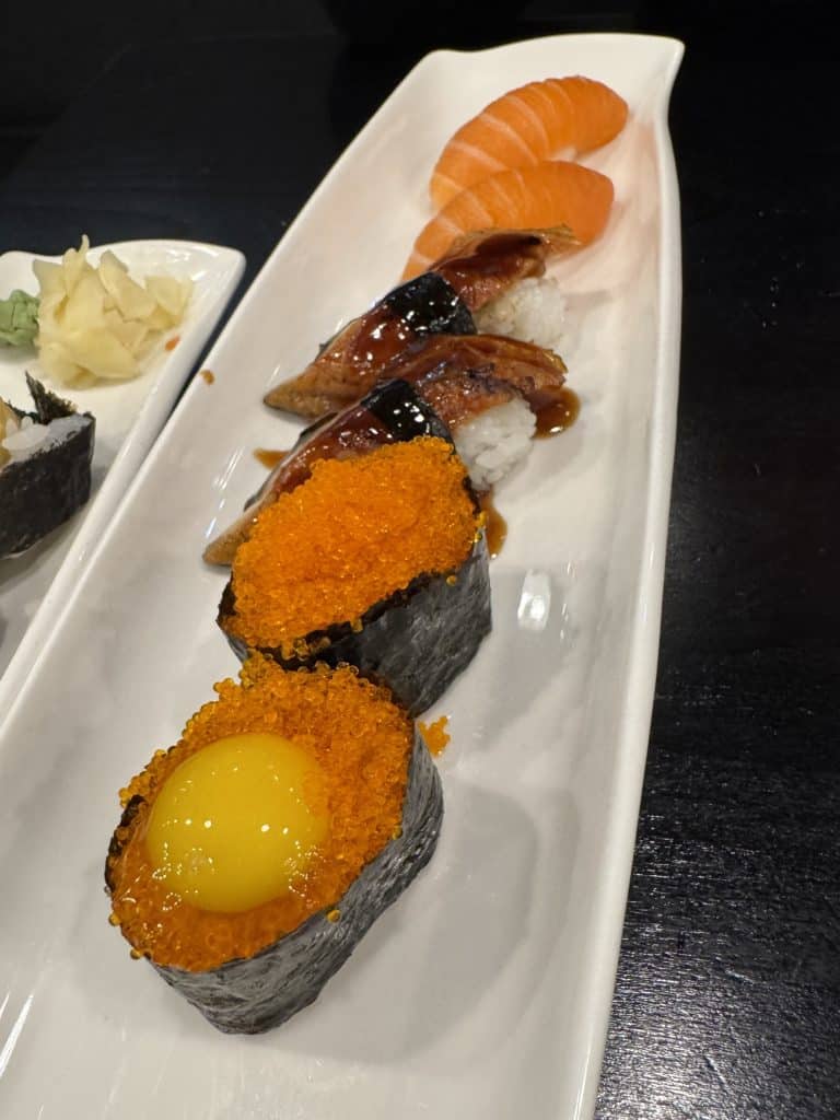 Tobiko with Quail Egg, Unagi and Sake Nigiri